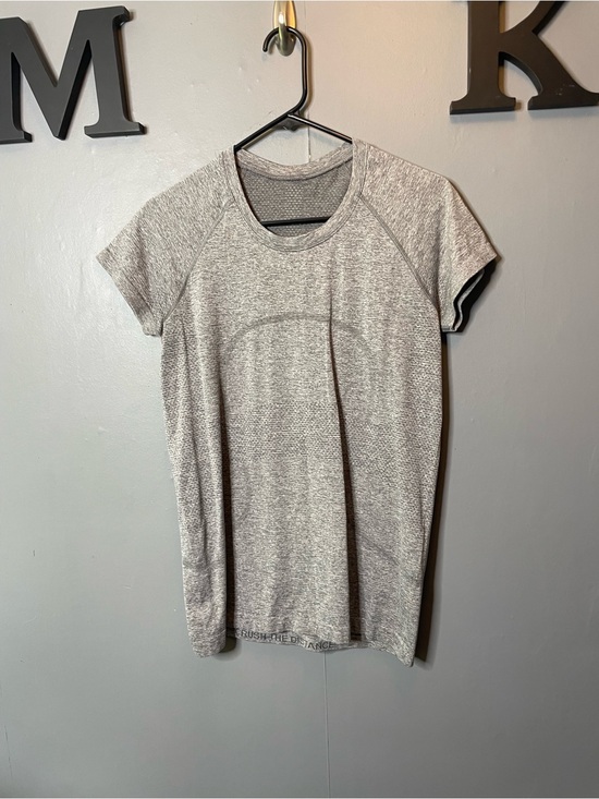 lululemon athletica Tops - Lululemon Swiftly tech hip length short sleeve Crewneck tee Gray size 10